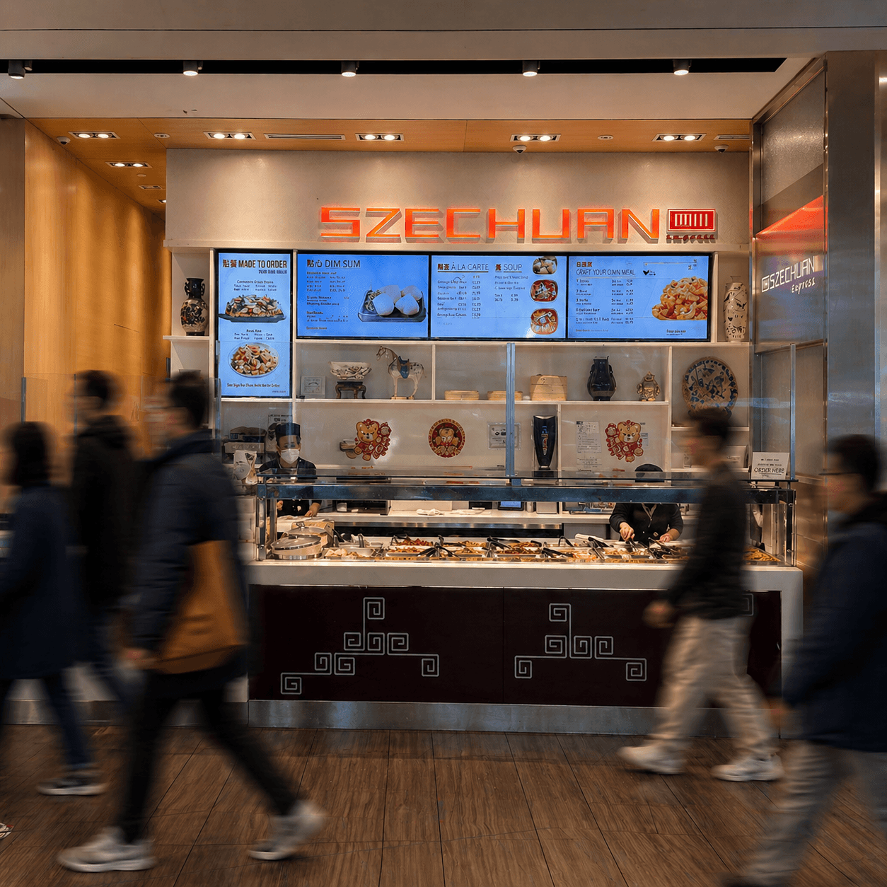 Szechuan Express storefront with guests walking by
